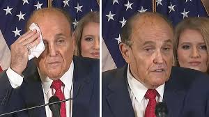 There are several additional pictures of giuliani from this news conference with dark streaks running down his face. Rudy Giuliani S Hair Dye Running Down Face At Sweaty News Conference