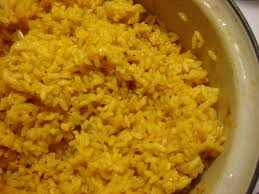 Add 4 cups cold water and all the remaining ingredients except the chopped cilantro leaves. Latin Style Yellow Rice Arroz Amarillo Hot Cheap Easy