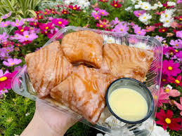 • 4 for $8.49 6 for $9.99 10 for $12.99 •…» Review Bananas Foster Glazed Beignets At Ralph Brennan S Jazz Kitchen Express In Downtown Disney District Disneyland News Today