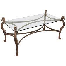 Wrought iron coffee table with glass tops, stone and wood look elegant, durable and beautiful for your living room. Decorative Cast Iron And Glass Top Cocktail Or Coffee Table With Horse Head Legs For Sale At 1stdibs