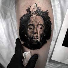 60 bob marley tattoos fur manner jamaikanische design ideen mann stil tattoo bob marley tattoos bob marley tattoos manner