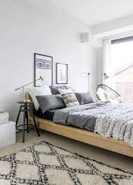 The area looks beautiful and comfortable. The Work Of Laura Seppanen Nordic Design Modern Bohemian Bedroom Bedroom Inspiration Grey Bedroom Styles