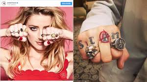 Hollywood star johnny depp has changed his tattoo for amber heard from her nickname slim to scum. Amber Heard Appears To Poke Fun At Johnny Depp S Scum Tattoo Youtube
