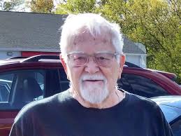 John E. Lampman Obituary (1928