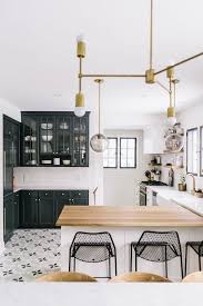 The kitchen decorating experts at hgtv.com share 58 traditional, modern black and white kitchens are a color trend that will never fade; Becki Owens Color Combinations Black White Interior Design Kitchen Home Kitchens Kitchen Interior