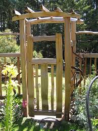 It's true flea market gardening style! Garden Arbor With Gate You Ll Love In 2021 Visualhunt