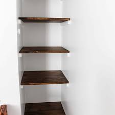 I think the design is simple yet functional and just looks interesting the way that it only uses two legs and the wall for stability. Build A Simple Wall To Wall Shelves Twofeetfirst