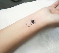 The color of the ink, the length of the word(s), style of design, and the lettering all determine how it will ultimately look. S Daintyinitialtattoo Dovme Fikirleri Tattoo Dovme