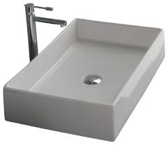 rectangular white ceramic vessel sink