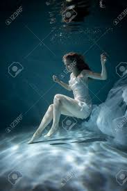 Likewise, sports photography and underwater photography team up when women are photographed in pools swimming for olympic gold or in the ocean going for a triathlon title. Surreal Woman Underwater Photography Jack Frost