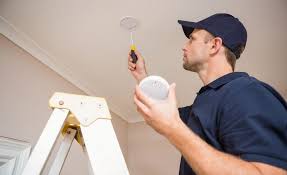 Your smoke detector has a mounting bracket to make installation and battery changes easier. Watkins Electrical Smoke Alarm Systems Installation Repairs Testing