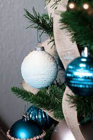 Mod podge with a foam brush; Easy Diy Coastal Christmas Ornaments My Wee Abode