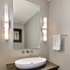 How To Light A Bathroom Vanity Ylighting Ideas Modern Bathroom Lighting Bathroom Vanity Designs Modern Bathroom