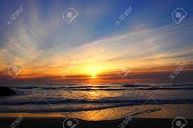 Recreating an atmosphere of the last. Sunset Halo At Piha Beach Stock Photo Picture And Royalty Free Image Image 90329984
