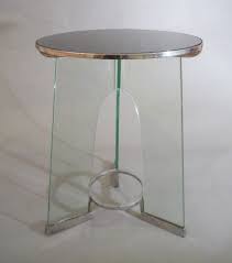Tempering puts the outer surfaces into compression and the interior into tension.such stresses cause the glass, when broken, to shatter into small granular chunks instead of splintering into jagged shards as ordinary annealed glass does. Ponti Rationalist Occasional Table Brian Kish Gio Ponti Occasional Table Contemporary Furniture Design