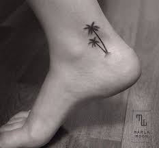 There are very few tattoo designs that are as universally coveted as a tropical palm tree. Tiny Tattoo Ideas For Girls Palm Tattoos Cute Ankle Tattoos Palm Tree Tattoo Ankle