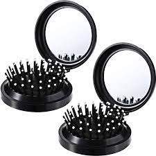 Another ergonomically designed hairbrush from aozzy, it's suitable for both men and women. Pack Of 2 Folding Travel Mirror Hair Brushes Round Folding Pocket Hair Brush Mini Hair Comb Compact Travel Size Hair Massage Comb For Women And Girls Black Amazon De Beauty