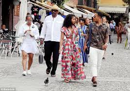 Memphis Depay Puffs Cigar On Holiday With Fiancee Daily Mail Online