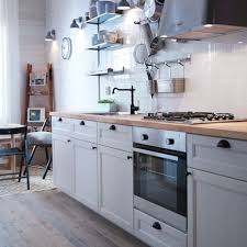 White Cabinets Ikea Bodbyn With Cup Shaped Black Handles Ikea Fagleboda And Butcher Blo Kitchen Renovation Kitchen Remodel Cottage Kitchen Design