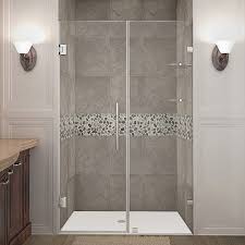 Frameless shower doors can be really fun to use in your bathroom, but most people are scared to measure the area where the door will go based on the hinges and height of your specific shower be sure to clean the bathtub out because there may be a layer of dust sitting in the bottom of it. Aston Nautis Gs Completely Frameless Hinged Shower Door With Glass Shelves 68 X 72 Polished Chrome Amazon Com