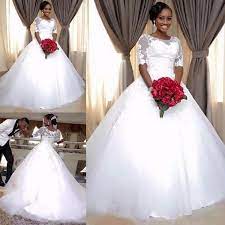 Discountsouth African A Line Wedding Dresses Sheer Neck Half Sleeves Plus Size Lace Wedding Bridal Gowns Custom Made From Dressesgirl 147 36 Dhgate Com Sheer Wedding Dress Lace Bridal Gown Ball Gowns Wedding