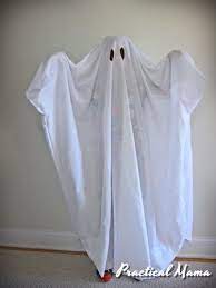 Easy Ghost Costume For Kids Ideal If You Ve Been Feeling Less Crafty Or Waited Until The Last Ghost Costume Kids Ghost Costume Diy Halloween Costumes For Kids