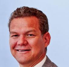 Andrew Jansen hands over the baton