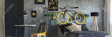 Bedroom interior in modern style. Modern Bedroom With Grey Walls And Yellow Accessories Stock Photo Picture And Royalty Free Image Image 72323070