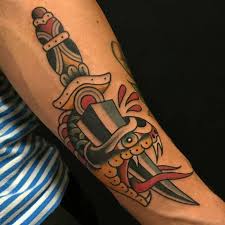 The snake and knife tattoo shows that life is a constant fight or battle. 150 Amazing Snake Tattoos Ultimate Guide February 2021