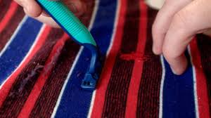 Removing clothing pilling with a shaver. How To Remove Pilling From Carpet Detailingwiki The Free Wiki For Detailers