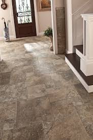 When It Comes To Home Entryways Practicality Is Key Consider A Stone Look Floor Tile Which Offers Natural Sh Entryway Flooring House Flooring Stone Flooring