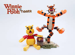 That spells tigger! look at those beady little eyes, and that preposterous chin, and those ridiculous striped pajamas. i'm the only tigger! watch me scare the stripes off of this imposter. Lego Ideas Winnie The Pooh And Tigger