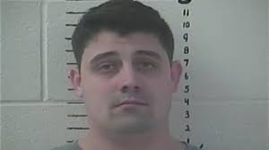 Police arrest one man, searching for another after 11 stolen street signs  found