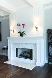 Black And White Fireplace Surround Striking Marble Fireplace In Transitional Living Room Home Fireplace Transitional Living Rooms Living Room With Fireplace