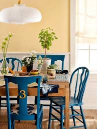 Cobalt Blue Dining Chair With Yellow Numerical Detail And Patterned Seat Upholstery And Vanilla Wall With Painted Chairs Dining Room Mismatched Furniture Home