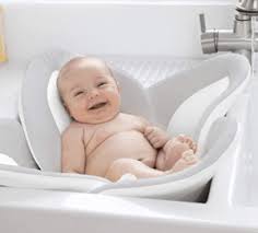 Baby bathtubs help parents make bathing their little one a whole lot easier. Blooming Bath Flower Baby Bath Review Momma Survival Guide