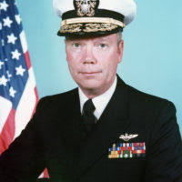 Rear Admiral (lower half) Robert E. Traister, USN (uncovered)