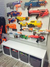 Used various hooks, wood screws, and nails to mount the guns. Diy Nerf Gun Rack Nerf Gun Organization On Pinterest Nerf Gun Storage There Are 29 Nerf Gun Rack For Sale On Etsy And They Cost 21 46 On Average Slyvia Kays