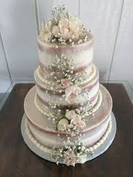 How To Save Money On Ordering Wedding Cakes Through A Local Bakery Cheap Ways To Budget Wedding Cake Wedding Cake Cost Wedding Cakes