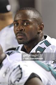 Wide receiver Johnnie Lee Higgins of the Philadelphia Eagles sits on...  News Photo