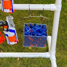 Buy two 2′ x 4′ peg boards and several packages of different style peg hooks. Diy Nerf Gun Storage Rack The Handyman S Daughter