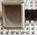 Crystal oscillator with inverter gate, crystal engraved with ...