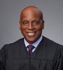 Under the RESTRICT Act, would a person be fined up to $1 million and  imprisoned for a minimum of 20 years for accessing content