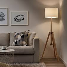 This lamp has a white tripod base, black spherical ball screws and it is wrapped in the middle with red plastic. Lauters Floor Lamp With Led Bulb Ash White Ikea