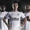 The color of the away kit is red and black. 1