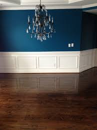 Sherwin Williams Oceanside Blue Walls Dining Room With Dark Hardwood Floors Crystal And Iron Chandel Dining Room Blue Dining Room Colors Hardwood Floors Dark
