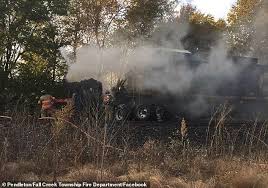 Stuck in a trash compactor | chicago fire. Shocking Moment A Train Crashes Into A Truck Stuck On The Tracks In Indiana Daily Mail Online
