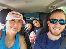 My grand daughter Maddie who is also my Executive Assistant & her little  buddy George