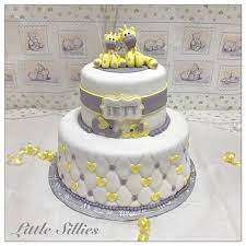 A Yellow And Grey Giraffe And Elephant Themed Baby Shower Cake Baby Shower Giraffe Giraffe Baby Shower Cake Elephant Baby Shower Boy
