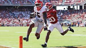 Bulldogs cruise past Razorbacks in SEC season opener — Yahoo Sports